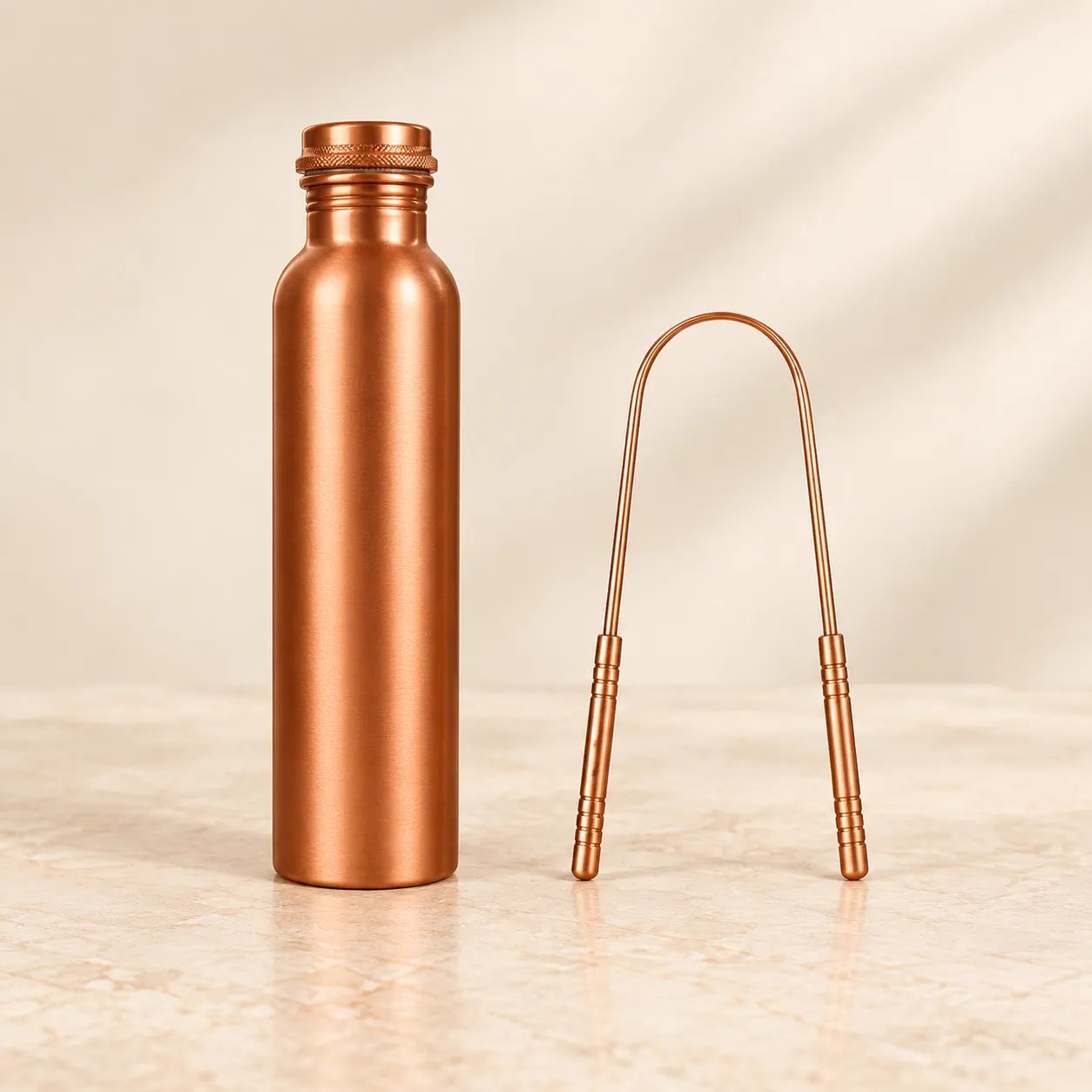 Copper Water Bottle & Tongue Scraper Set — Ayurvedic Morning Ritual Kit — studio product photo